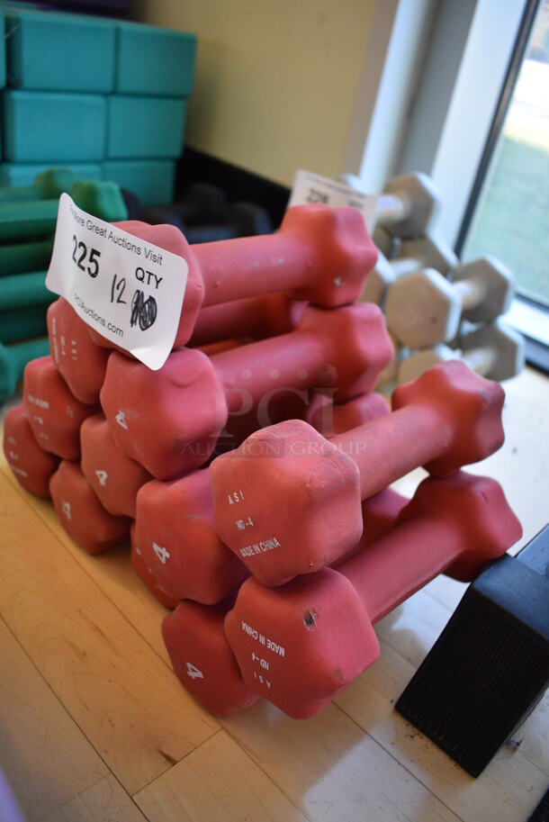 12 Red Neoprene 4 Pound Hex Dumbbells. 2.5x7x2.5. 12 Times Your Bid! (aerobic room) - Image 2 of 3