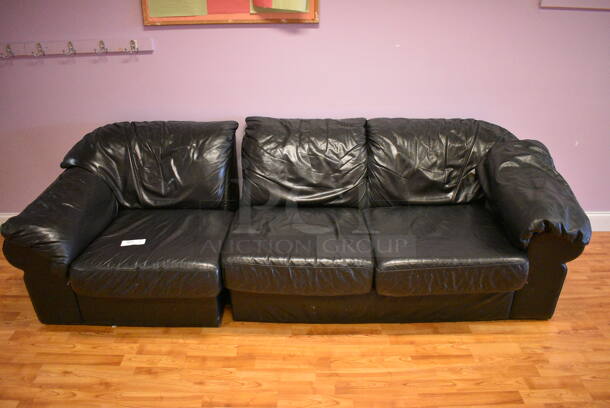 Black Couch That Separates Into 2 Pieces. (daycare)