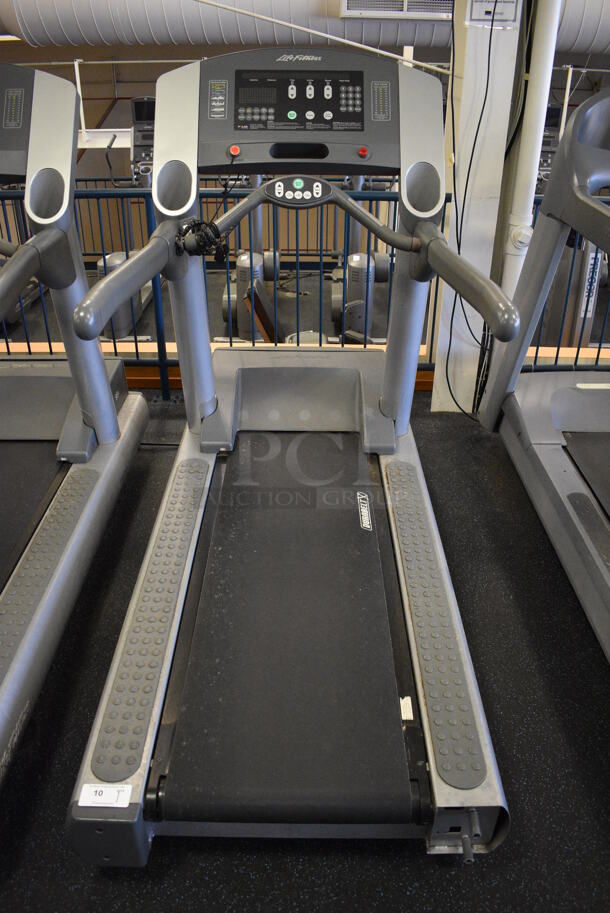 NICE! Life Fitness Model 95Ti Metal Heavy Duty Commercial Floor Style Treadmill w/ Heart Rate Sensors. 120 Volts, 1 Phase. BUYER MUST REMOVE. 36x84x65. Tested and Working! (upstairs) This Unit Will Be Moved Down To The First Floor Before Pick Up Day Begins! - Image 1 of 8