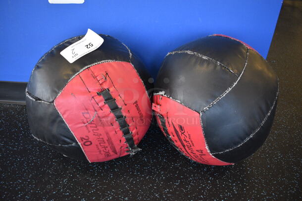 2 PowerMax Red and Black Medicine Balls; 14 and 20 Pound. 14x14x14. 2 Times Your Bid! (upstairs)
