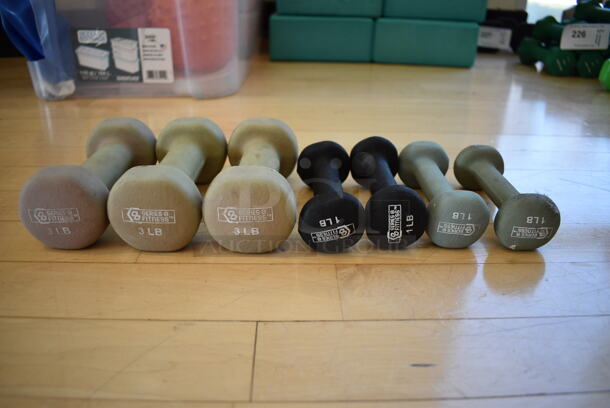 7 Various Neoprene Dumbbells; Three 3 Pound, Four 1 Pound. Includes 2.5x5.5x2.5. 7 Times Your Bid! (aerobic room)