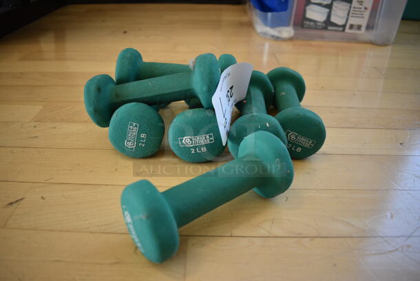 7 Green Neoprene 2 Pound Dumbbells. 2x5x2. 7 Times Your Bid! (aerobic room)