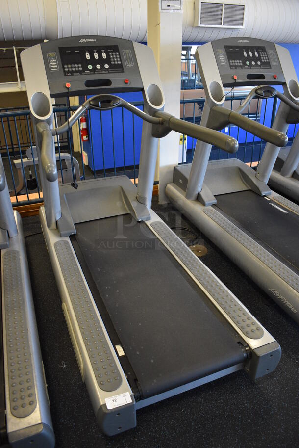 NICE! Life Fitness Model 95Ti Metal Heavy Duty Commercial Floor Style Treadmill w/ Heart Rate Sensors and Cup Holders. 120 Volts, 1 Phase. BUYER MUST REMOVE. 36x84x65. Tested and Working! (upstairs) This Unit Will Be Moved Down To The First Floor Before Pick Up Day Begins! - Image 2 of 9