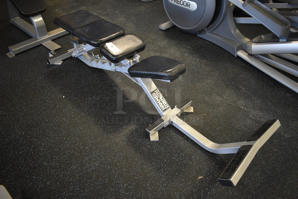 Hammer Strength Gray Metal Floor Style Adjustable Bench. BUYER MUST REMOVE. 23x72x16. (upstairs) - Image 1 of 4