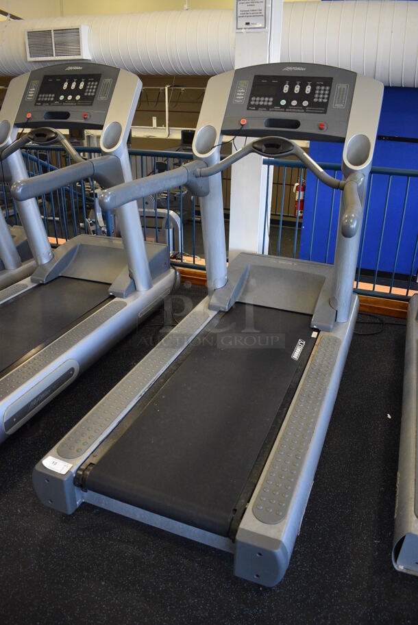 NICE! Life Fitness Model 95T Metal Heavy Duty Commercial Floor Style Treadmill w/ Heart Rate Sensors and Cup Holders. 120 Volts, 1 Phase. BUYER MUST REMOVE. 36x84x65. Tested and Working! (upstairs) This Unit Will Be Moved Down To The First Floor Before Pick Up Day Begins! - Image 3 of 8