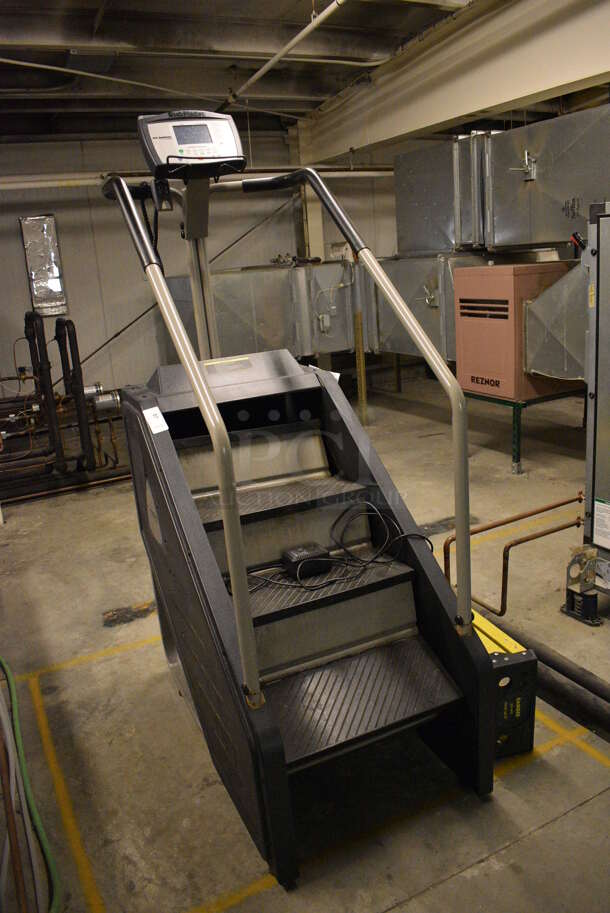 Nautilus Model Stepmill Metal Stair Master Floor Style Stair Machine. BUYER MUST REMOVE. 29x50x85. Tested and Does Not Power On. (upstairs) This Unit Will Be Moved Down To The First Floor Before Pick Up Day Begins! - Image 2 of 8