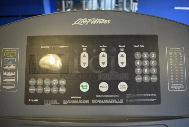 NICE! Life Fitness Model 95T Metal Heavy Duty Commercial Floor Style Treadmill w/ Heart Rate Sensors and Cup Holders. 120 Volts, 1 Phase. BUYER MUST REMOVE. 36x84x65. Tested and Working! (upstairs) This Unit Will Be Moved Down To The First Floor Before Pick Up Day Begins! - Image 7 of 8