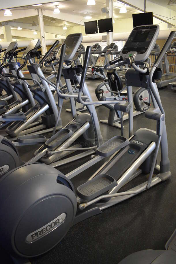 NICE! Precor Model EFX556i Experience Metal Floor Style Elliptical Cross Trainer Machine. BUYER MUST REMOVE. 31x84x66. Tested and Working! (upstairs) This Unit Will Be Moved Down To The First Floor Before Pick Up Day Begins! - Image 1 of 8