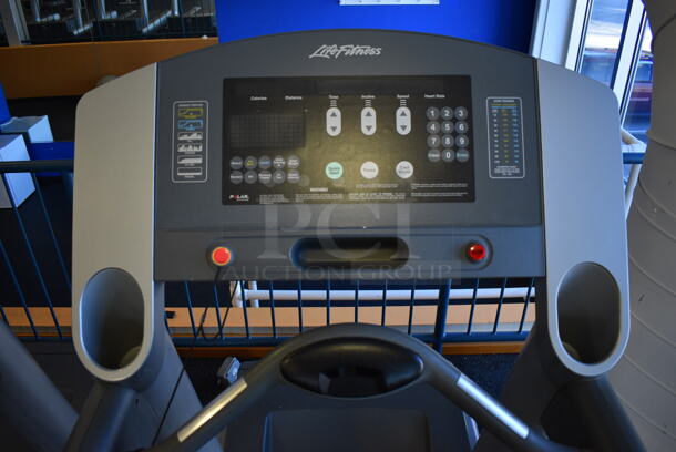 NICE! Life Fitness Model 95T Metal Heavy Duty Commercial Floor Style Treadmill w/ Heart Rate Sensors and Cup Holders. 120 Volts, 1 Phase. BUYER MUST REMOVE. 36x84x65. Tested and Working! (upstairs) This Unit Will Be Moved Down To The First Floor Before Pick Up Day Begins! - Image 6 of 8
