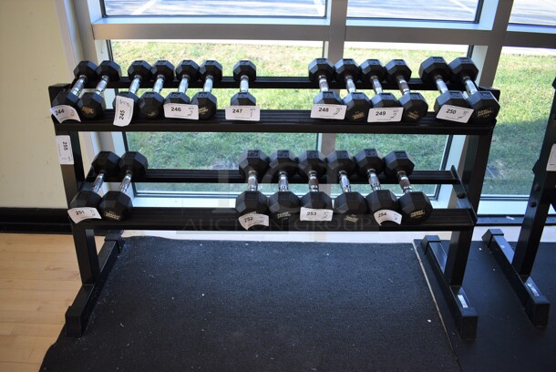 Black Metal 2 Tier Dumbbell Rack. Does Not Come w/ Contents. BUYER MUST REMOVE. 58x21x32. (aerobic room)