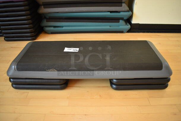 Gray and Black Aerobic Stepper Exercise Work Out Step w/ 4 Risers. 43x15x9. (aerobic room)