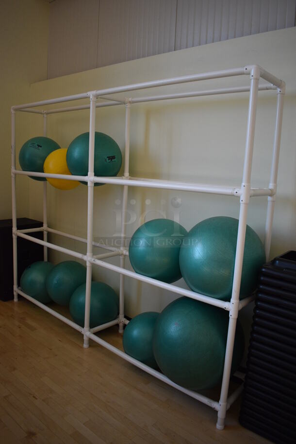 White Poly Rack. Does Not Include Contents. BUYER MUST REMOVE. 105x17x83. (aerobic room)