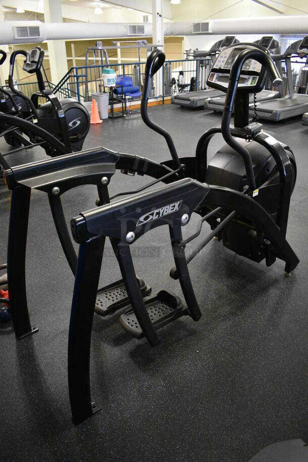 NICE! Cybex Model 630A Metal Floor Style Metal Arc Trainer Machine. BUYER MUST REMOVE. 30x78x59. Tested and Working! (upstairs) This Unit Will Be Moved Down To The First Floor Before Pick Up Day Begins!