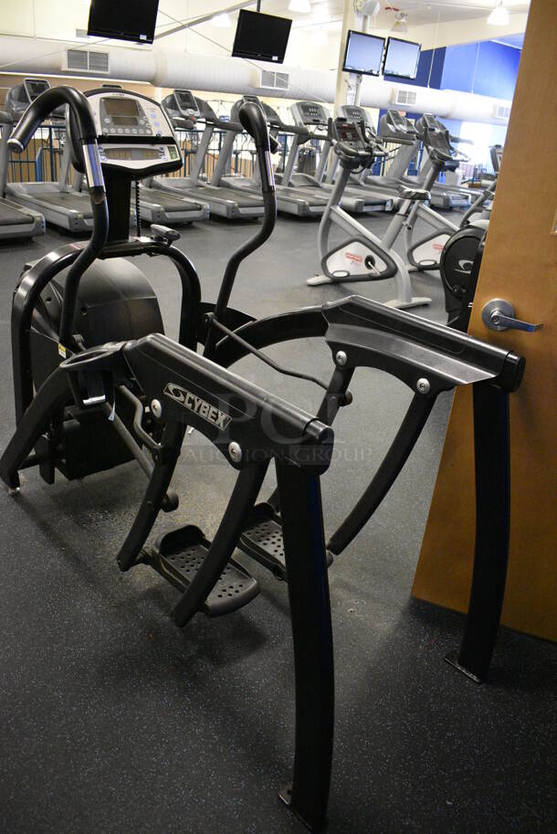 NICE! Cybex Model 630A Metal Floor Style Metal Arc Trainer Machine. BUYER MUST REMOVE. 30x78x59. Tested and Working! (upstairs) This Unit Will Be Moved Down To The First Floor Before Pick Up Day Begins!