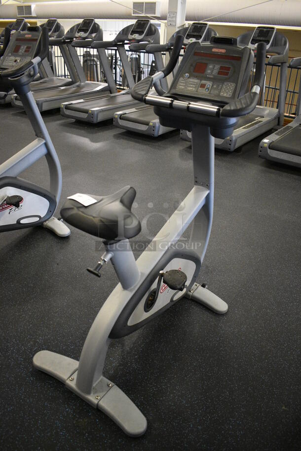 GREAT! Star Trac Pro Model 9-6330-SINTPO Metal Floor Style Upright Stationary Bicycle w/ 2 Cup Holders. BUYER MUST REMOVE. 29x44x58. Tested and Working! (upstairs) This Unit Will Be Moved Down To The First Floor Before Pick Up Day Begins! - Image 1 of 7