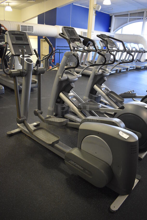 NICE! Life Fitness Model 95xi Experience Metal Floor Style Elliptical Cross Trainer Machine. BUYER MUST REMOVE. 31x86x64. Tested and Working! (upstairs) This Unit Will Be Moved Down To The First Floor Before Pick Up Day Begins! - Image 7 of 8