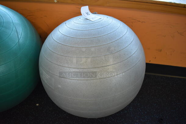 3 Various Stability Balls; 2 Green and 1 Gray. Includes 21x21x21. 3 Times Your Bid! (upstairs) - Image 2 of 4