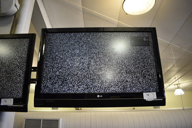 LG 42" Television. BUYER MUST REMOVE. Tested and Working! (upstairs) Unit Is Approximately 8 Feet Off Of The Ground - Image 1 of 5
