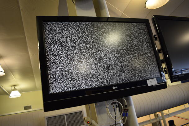 LG 42" Television. BUYER MUST REMOVE. Tested and Working! (upstairs) Unit Is Approximately 8 Feet Off Of The Ground - Image 2 of 4