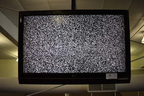 LG 42" Television. BUYER MUST REMOVE. Tested and Working! (upstairs) Unit Is Approximately 8 Feet Off Of The Ground