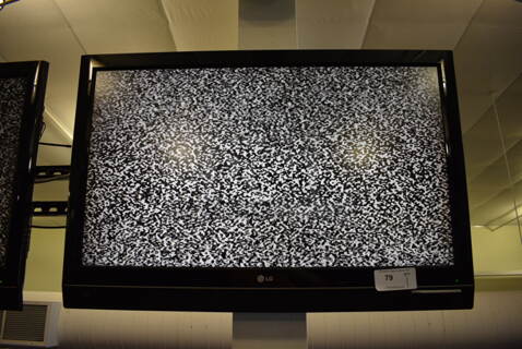 LG 42" Television. BUYER MUST REMOVE. Tested and Working! (upstairs) Unit Is Approximately 8 Feet Off Of The Ground
