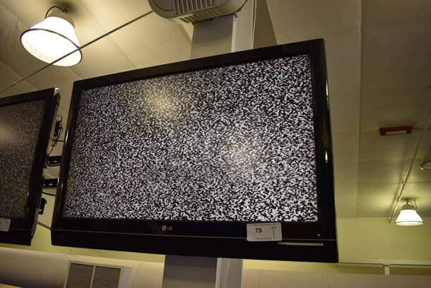 LG 42" Television. BUYER MUST REMOVE. Tested and Working! (upstairs) Unit Is Approximately 8 Feet Off Of The Ground - Image 2 of 3
