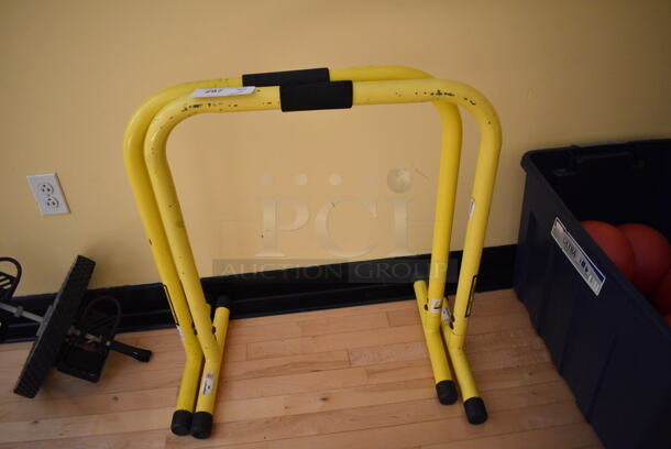 2 Yellow Paralettes. 25x16x28. 2 Times Your Bid! (ballet room - upstairs)