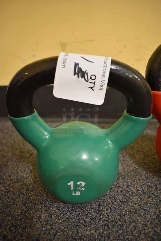 Power Systems Metal Green 12 Pound Kettlebell. 6.5x4x7.5. (upstairs - side room)
