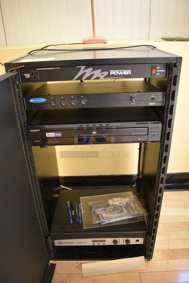 ALL ONE MONEY! Lot of Black Metal AV Cabinet w/ Middle Atlantic Power Amp, Crown  14M Rack, Sony DVP-NC85H CD/DVD Player and Crown CDi 1000 Rack. 20.5x19x36.5. (ballet room - upstairs) - Image 1 of 5
