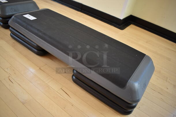 Gray and Black Aerobic Stepper Exercise Work Out Step w/ 4 Risers. Stock Picture - Cosmetic Condition May Vary. 43x15x9. (weight room) - Image 3 of 3