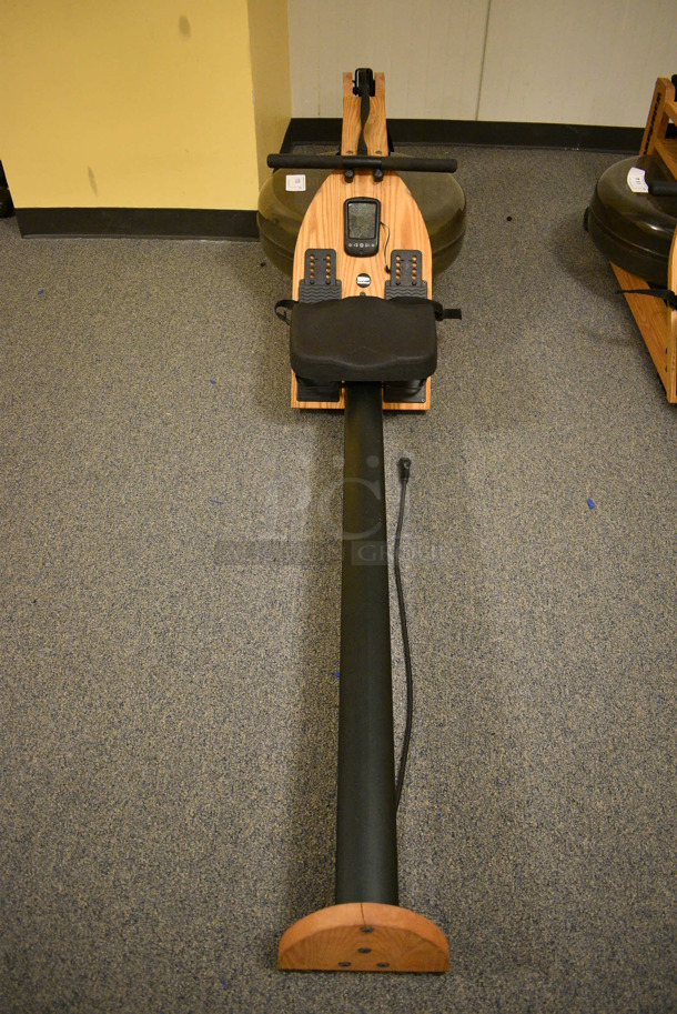 WaterRower GX Floor Style Wood Pattern Water Rowing Machine. Belt For Handle Is Detached. BUYER MUST REMOVE. 22x85x20. (upstairs - side room)