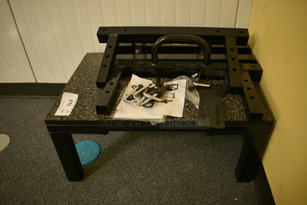 Black Metal Table w/ Pieces! BUYER MUST REMOVE. 28x20x12. (upstairs - side room)