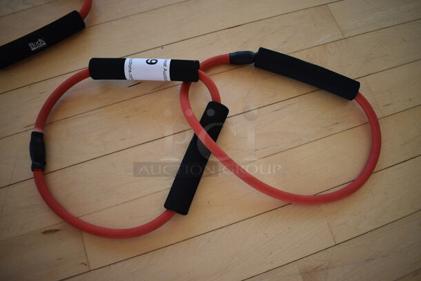 Set of 2 Red Resistance Bands. (aerobic room)
