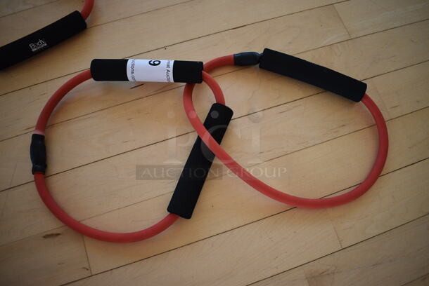 Set of 2 Red Resistance Bands. (aerobic room)
 - Image 1 of 2