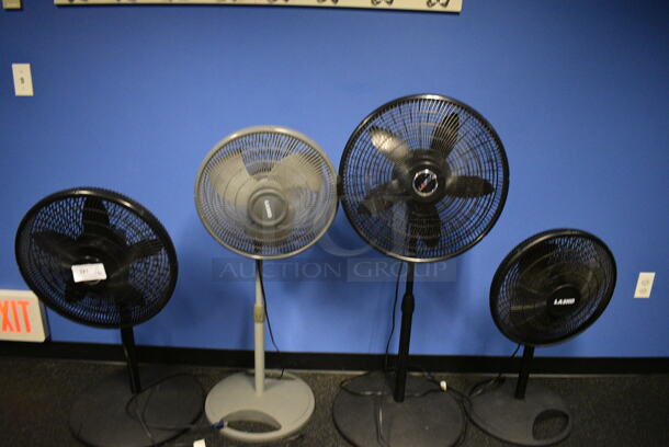 4 Various Poly Floor Style Fans. Includes 20x20x49. 4 Times Your Bid! (spin cycle room)