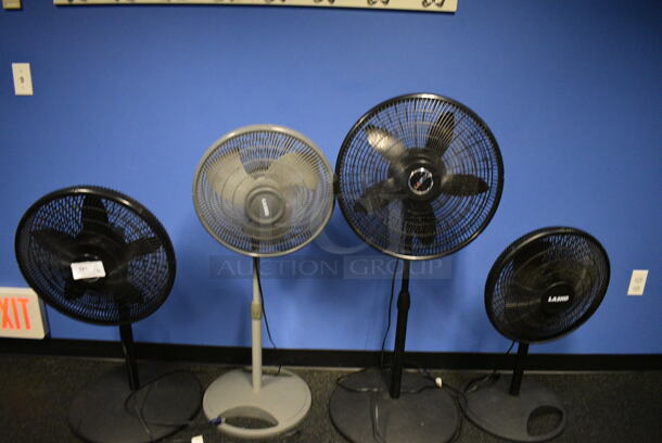 4 Various Poly Floor Style Fans. Includes 20x20x49. 4 Times Your Bid! (spin cycle room) - Image 1 of 4
