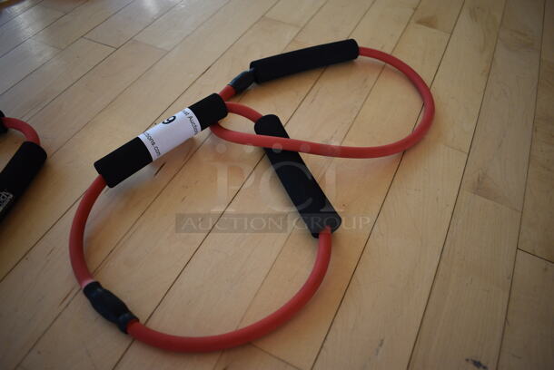 Set of 2 Red Resistance Bands. (aerobic room)
 - Image 2 of 2