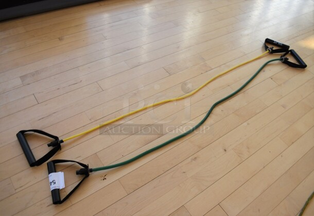 2 Resistance Bands; Yellow and Green. 2 Times Your Bid! (aerobic room)
