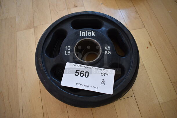 2 Intek Metal 10 Pound Weight Plates. BUYER MUST REMOVE. 2 Times Your Bid! (aerobic room)

