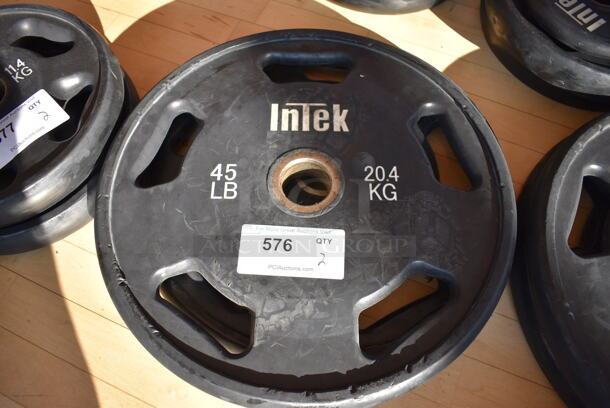 2 Intek Metal 45 Pound Weight Plates. BUYER MUST REMOVE. 2 Times Your Bid! (aerobic room)

