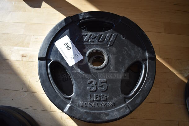 2 Troy Metal 35 Pound Weight Plates. BUYER MUST REMOVE. 2 Times Your Bid! (aerobic room)

 - Image 1 of 3