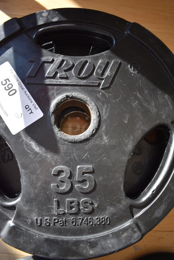 2 Troy Metal 35 Pound Weight Plates. BUYER MUST REMOVE. 2 Times Your Bid! (aerobic room)

 - Image 2 of 3