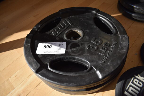 2 Troy Metal 35 Pound Weight Plates. BUYER MUST REMOVE. 2 Times Your Bid! (aerobic room)

 - Image 3 of 3