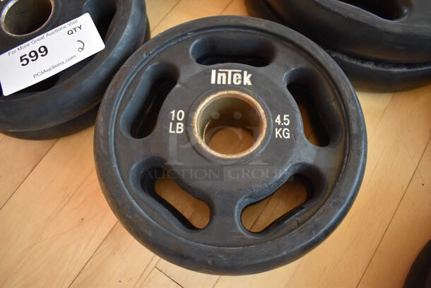 2 Intek Metal 10 Pound Weight Plates. BUYER MUST REMOVE. 2 Times Your Bid! (aerobic room)

