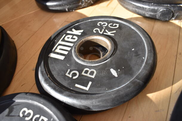 2 Intek Metal 5 Pound Weight Plates. BUYER MUST REMOVE. 2 Times Your Bid! (aerobic room)

 - Image 2 of 3