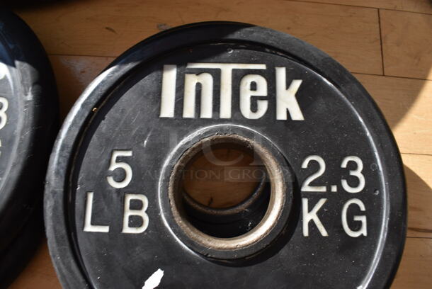 2 Intek Metal 5 Pound Weight Plates. BUYER MUST REMOVE. 2 Times Your Bid! (aerobic room)

 - Image 3 of 3
