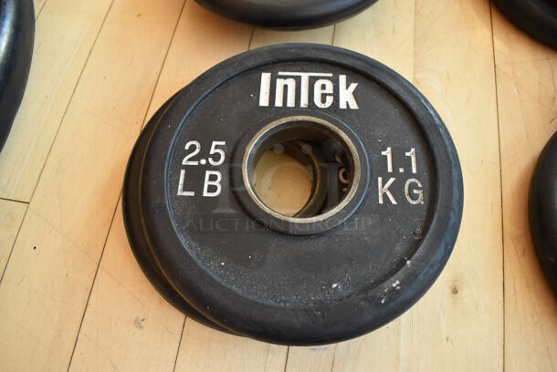 2 Intek Metal 2.5 Pound Weight Plates. BUYER MUST REMOVE. 2 Times Your Bid! (aerobic room)


