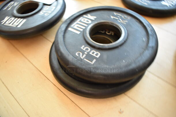 2 Intek Metal 2.5 Pound Weight Plates. BUYER MUST REMOVE. 2 Times Your Bid! (aerobic room)

 - Image 2 of 3