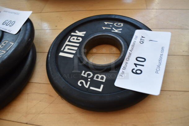 Intek Metal 2.5 Pound Weight Plate. BUYER MUST REMOVE. (aerobic room)

 - Image 2 of 3