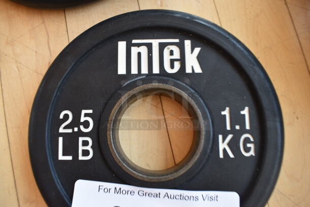 Intek Metal 2.5 Pound Weight Plate. BUYER MUST REMOVE. (aerobic room)

 - Image 3 of 3